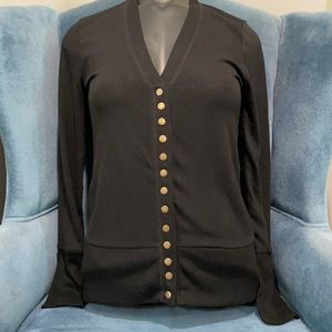 Black Cardigan. Snaps up front. Never worn